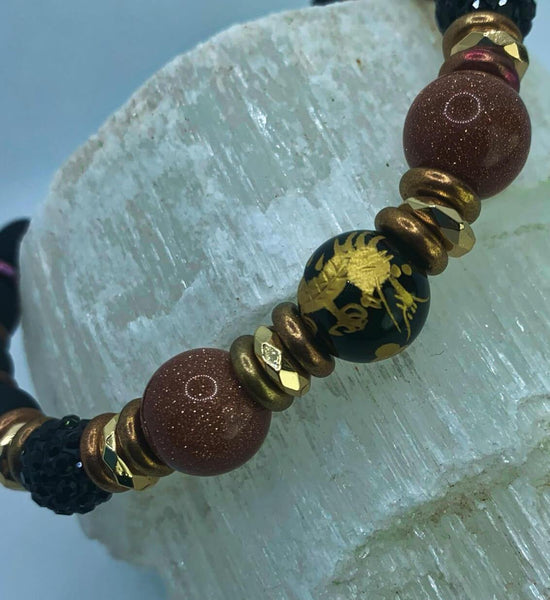 The Dragon Within Bracelets Gaia's Designs glam, glass, goldstone, healing, hematite, stretch