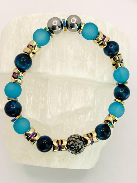 Ocean's Abroad Bracelets Gaia's Designs cat's eye, glam, glass, healing, hematite, semi-precious, stainless, stretch