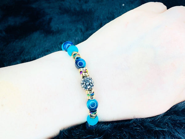 Ocean's Abroad Bracelets Gaia's Designs cat's eye, glam, glass, healing, hematite, semi-precious, stainless, stretch